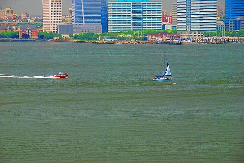 NY-Fleet_Week_2009-01-Police_Boat_Chases_Down_Sailboat.JPG