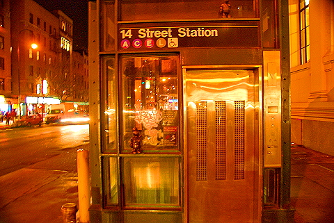 NY-W14th_Street_Nightshots-19-ACEL_Subway-Tom_Otterness.JPG